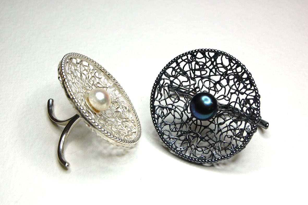3.silver and pearl cocktail rings.jpg